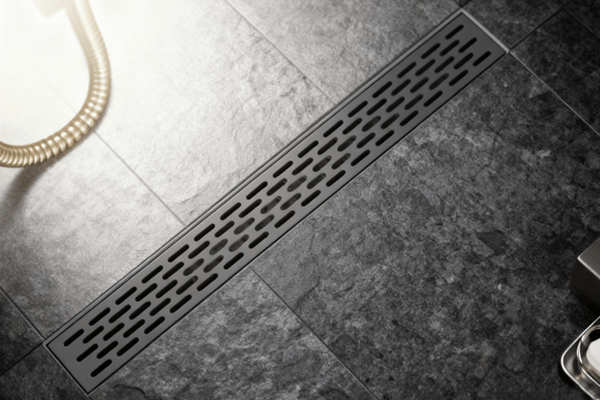how to clean a linear shower drain properly in a modern bathroom