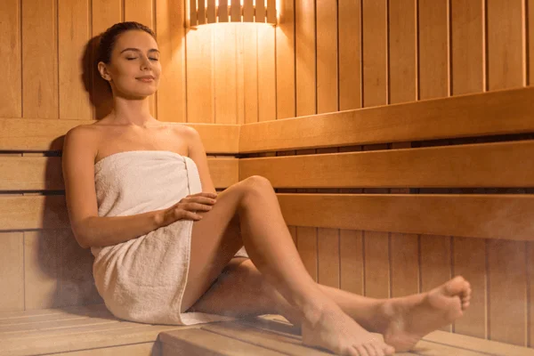 Relaxing sauna session showing reduced stress and improved well-being